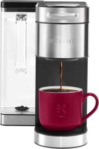 A sleek Keurig K-Supreme Plus Coffee Maker is displayed, featuring Single-Serve K-Cup Pod Coffee Brewer with MultiStream Technology. The appliance includes a 78-oz Removable Reservoir,