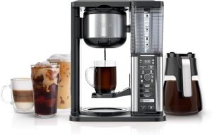 "Ninja Specialty Coffee Maker CM401 in Black, for hot & iced coffee with 6 brew styles, 8 sizes from small cup to travel mug, 10-cup carafe, fold-away frother, permanent filter, and removable reservoir."