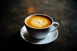 A cup of espresso with tray on the table