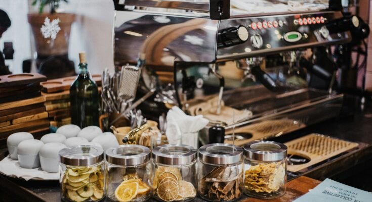 a coffee maker lying n table and K-cups aroud it