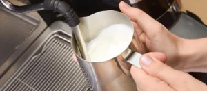 alt="Breville coffee machine instructions for steaming milk to make lattes"