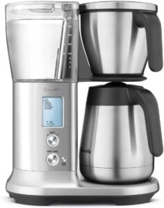 "An advanced drip coffee machine with a sleek stainless steel design. It features a large, thermal carafe and intuitive control panel with various brewing options."