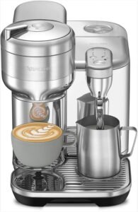 "A sleek espresso machine in Black Truffle finish from Breville's Nespresso Vertuo line. It features a built-in milk frother, multiple coffee sizes, and a stylish, modern design."