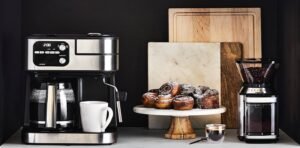 A clean, high-resolution image of multiple iced coffee makers on a counter (or in a kitchen setting).