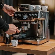 Breville Barista Express making espresso with crema