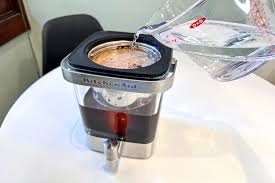 Cleaning a cold brew coffee maker for better performance.