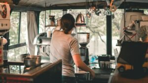 Image of a girl having joy with the coffee sho[.